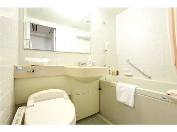 Imagen de la habitación del Hotel Dukes Hakata. Foto 17