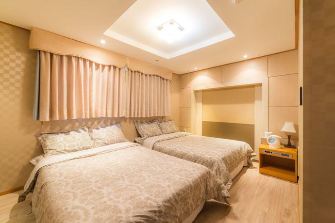 Imagen de la habitación del Hotel Duksan Oncheon Tower Hotel. Foto 2