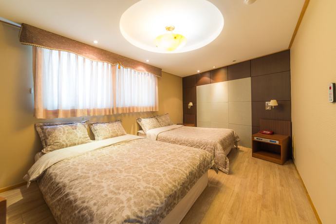 Imagen de la habitación del Hotel Duksan Oncheon Tower Hotel. Foto 4