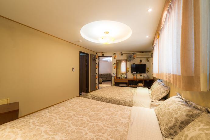Imagen de la habitación del Hotel Duksan Oncheon Tower Hotel. Foto 7