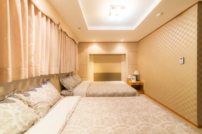 Imagen de la habitación del Hotel Duksan Oncheon Tower Hotel. Foto 9