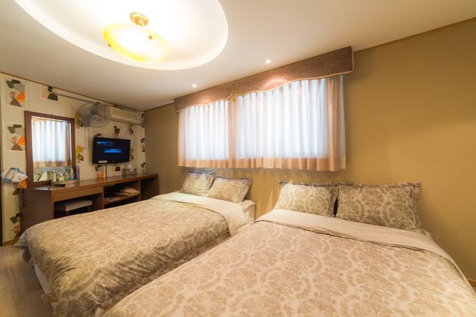 Imagen de la habitación del Hotel Duksan Oncheon Tower Hotel. Foto 10