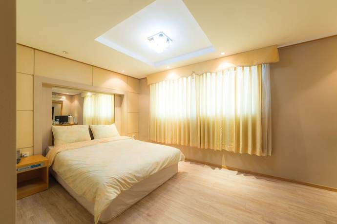 Imagen de la habitación del Hotel Duksan Oncheon Tower Hotel. Foto 13