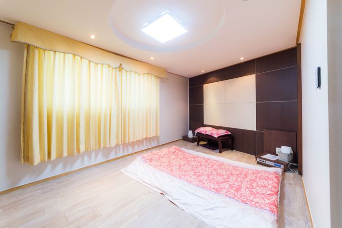 Imagen de la habitación del Hotel Duksan Oncheon Tower Hotel. Foto 15