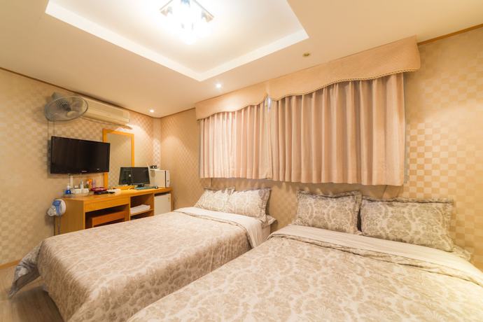 Imagen de la habitación del Hotel Duksan Oncheon Tower Hotel. Foto 16