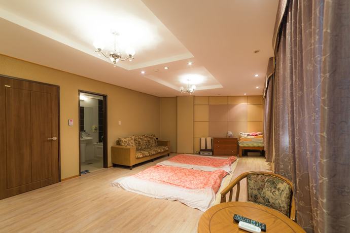 Imagen de la habitación del Hotel Duksan Oncheon Tower Hotel. Foto 17