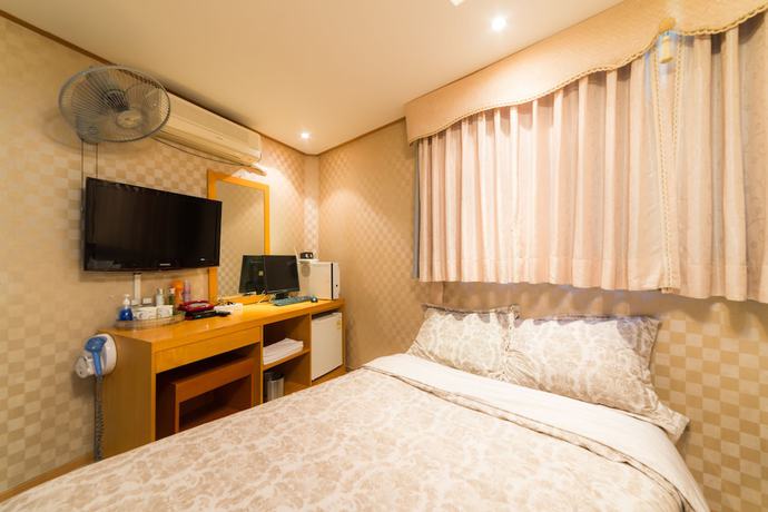 Imagen de la habitación del Hotel Duksan Oncheon Tower Hotel. Foto 18