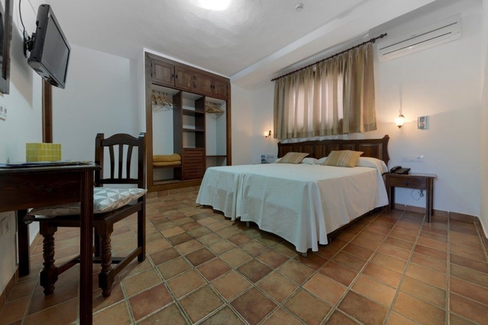 Imagen de la habitación del Hotel Dulce Nombre. Foto 16