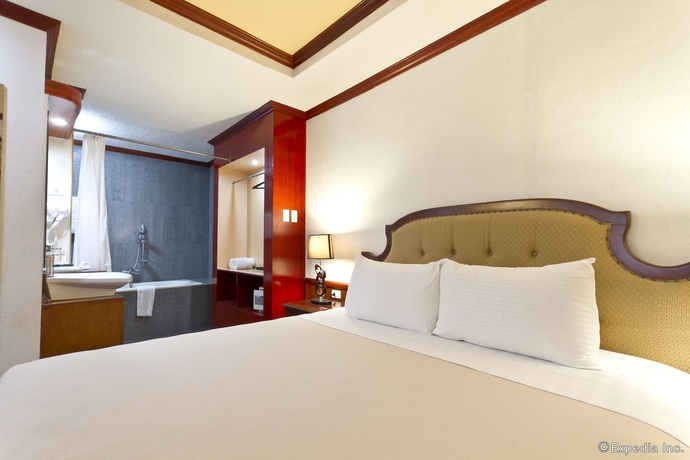 Imagen de la habitación del Hotel Dulcinea and Suites. Foto 7