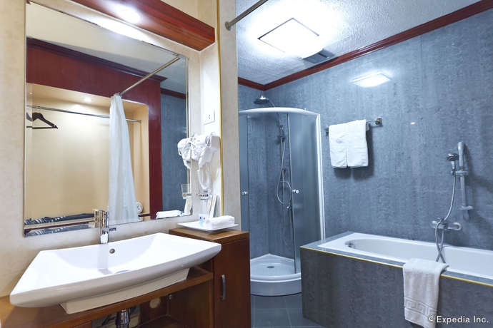 Imagen de la habitación del Hotel Dulcinea and Suites. Foto 9
