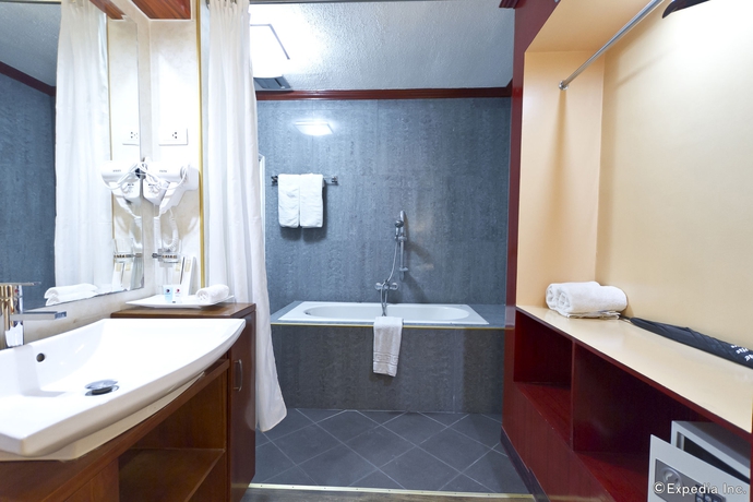 Imagen de la habitación del Hotel Dulcinea and Suites. Foto 10