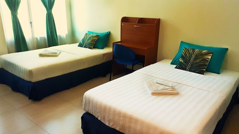 Imagen de la habitación del Hotel Dumaguete Dormitel. Foto 15