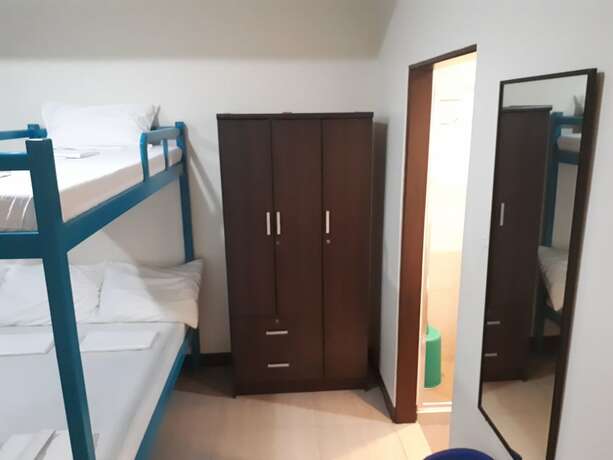 Imagen de la habitación del Hotel Dumaguete Dormitel. Foto 16