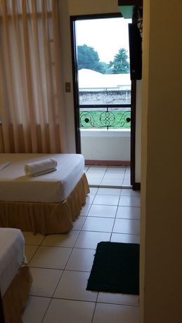 Imagen de la habitación del Hotel Dumaguete Royal Suite Inn. Foto 6