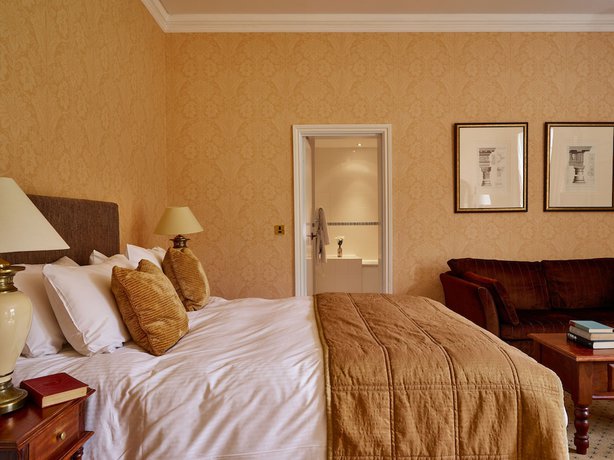 Imagen de la habitación del Hotel Dumbleton Hall. Foto 13