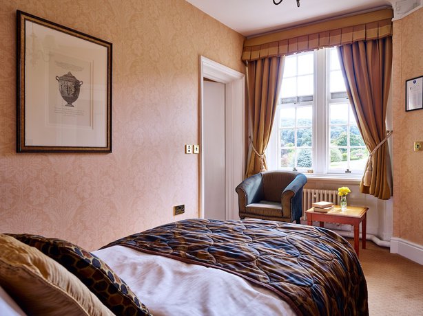 Imagen de la habitación del Hotel Dumbleton Hall. Foto 15