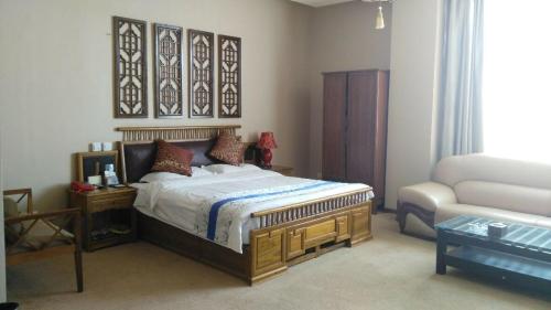 Imagen de la habitación del Hotel Dun Huang Yue Tian Shang Wu Jiu Dian. Foto 7