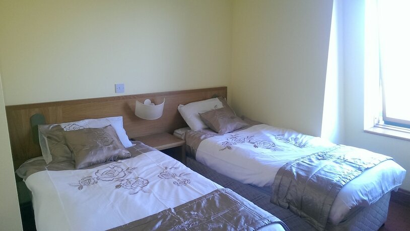 Imagen de la habitación del Hotel Dunbur Lodge. Foto 12