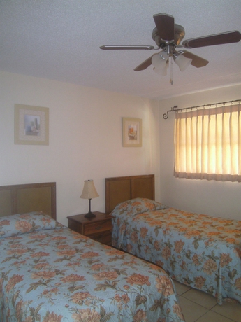 Imagen de la habitación del Hotel Dundee Bay Villas. Foto 4