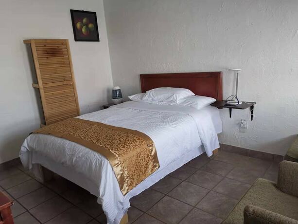 Imagen de la habitación del Hotel Dundurn Motel. Foto 19