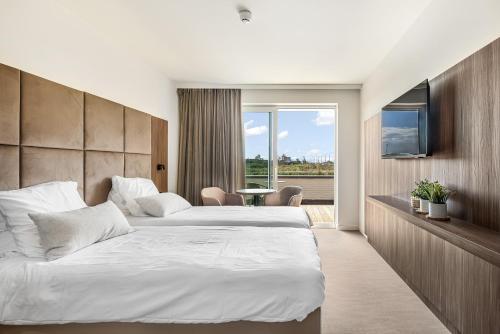 Imagen de la habitación del Hotel Dune Nieuwpoort. Foto 18