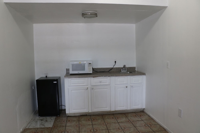 Imagen de la habitación del Hotel Dunedin Cove Motel. Foto 16