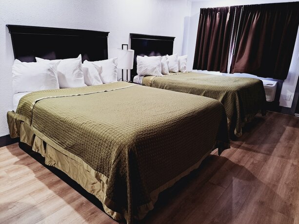 Imagen de la habitación del Hotel Dunes Motel. Foto 12