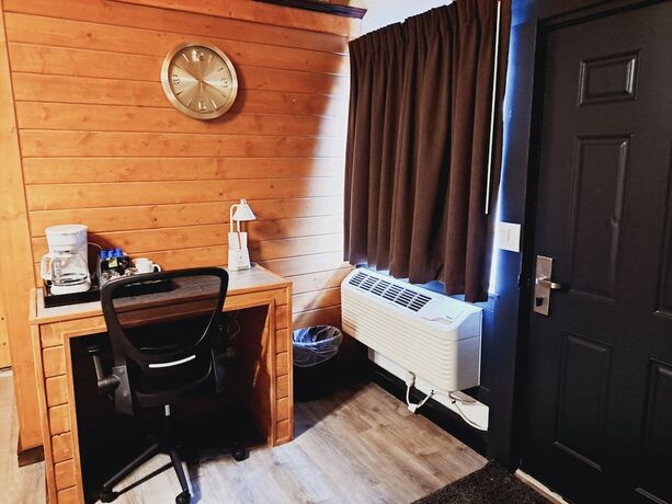 Imagen de la habitación del Hotel Dunes Motel. Foto 13