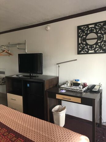 Imagen de la habitación del Hotel Dunes Motel. Foto 15