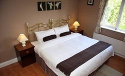 Imagen de la habitación del Hotel Dungimmon House. Foto 7