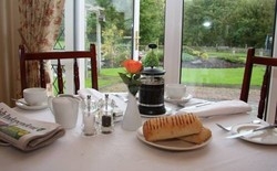 Imagen del bar/restaurante del Hotel Dungimmon House. Foto 5