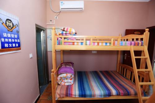 Imagen de la habitación del Hotel Dunhuang 8090 Guest House. Foto 1