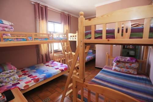 Imagen de la habitación del Hotel Dunhuang 8090 Guest House. Foto 2