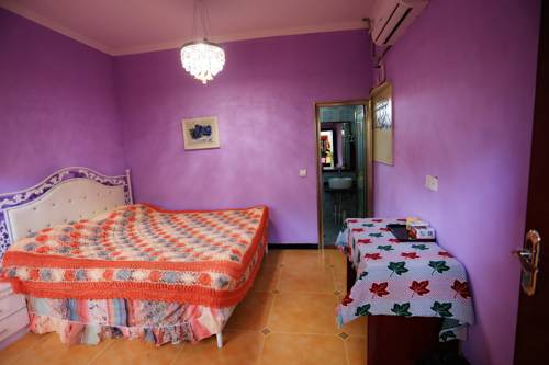 Imagen de la habitación del Hotel Dunhuang 8090 Guest House. Foto 4