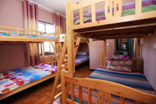 Imagen de la habitación del Hotel Dunhuang 8090 Guest House. Foto 5