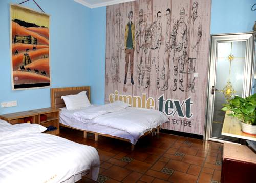 Imagen de la habitación del Hotel Dunhuang 8090 Guest House. Foto 6