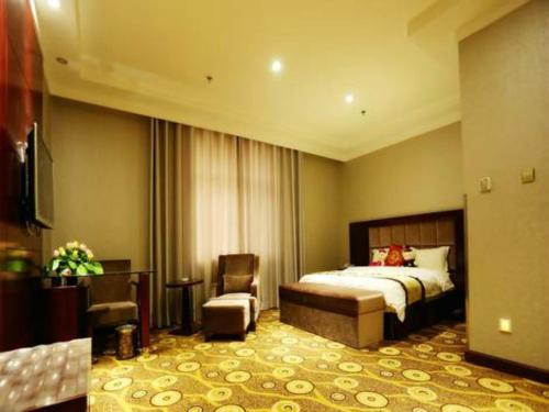 Imagen de la habitación del Hotel Dunhuang Bin He Century Business. Foto 4