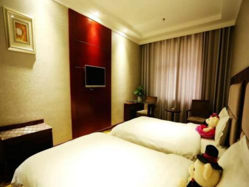 Imagen de la habitación del Hotel Dunhuang Bin He Century Business. Foto 5