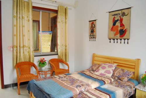 Imagen de la habitación del Hotel Dunhuang Brother Ge Inn. Foto 3