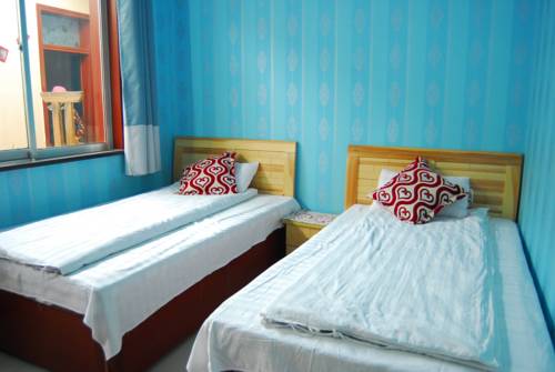 Imagen de la habitación del Hotel Dunhuang Brother Ge Inn. Foto 4