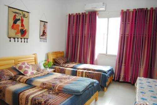 Imagen de la habitación del Hotel Dunhuang Brother Ge Inn. Foto 6