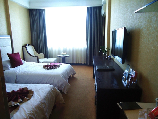 Imagen de la habitación del Hotel Dunhuang Dunhe. Foto 13