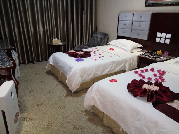 Imagen de la habitación del Hotel Dunhuang. Foto 2