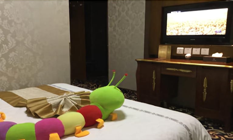 Imagen de la habitación del Hotel Dunhuang. Foto 5