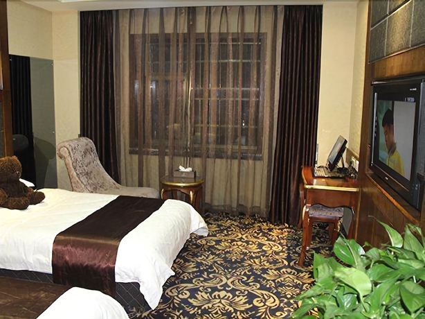 Imagen de la habitación del Hotel Dunhuang. Foto 7