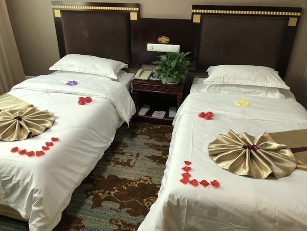 Imagen de la habitación del Hotel Dunhuang. Foto 13