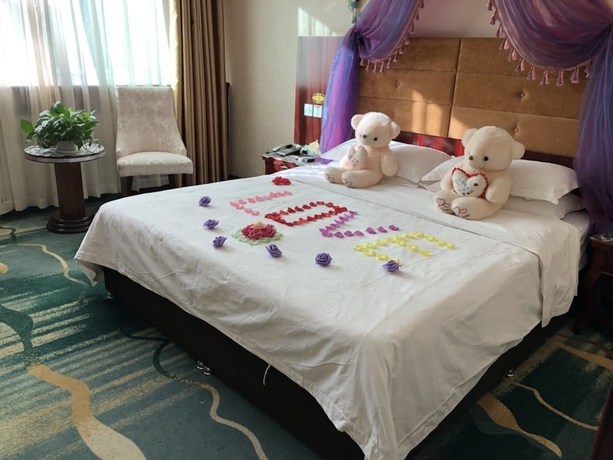 Imagen de la habitación del Hotel Dunhuang. Foto 14