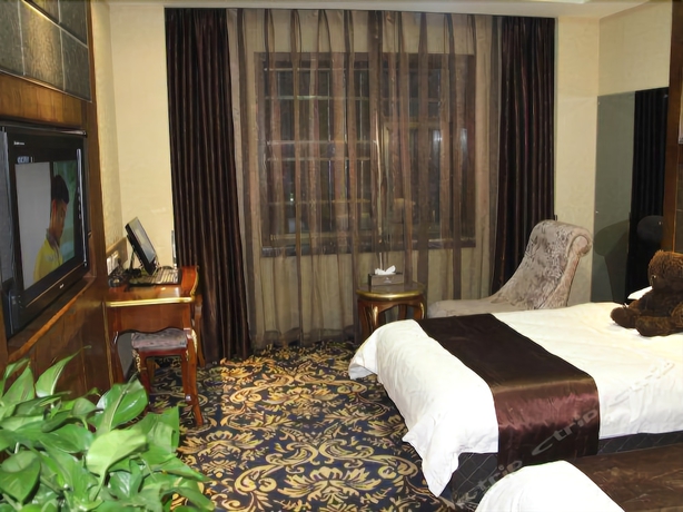 Imagen de la habitación del Hotel Dunhuang. Foto 15