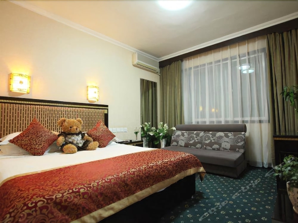 Imagen de la habitación del Hotel Dunhuang. Foto 17