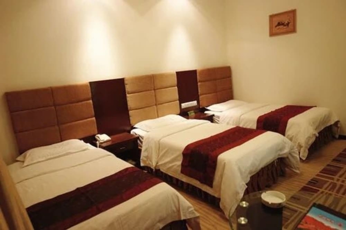 Imagen de la habitación del Hotel Dunhuang Golden Leaf. Foto 7